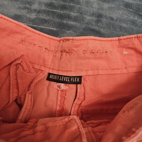 Men's Coral American Eagle Next Level Stretch Shorts! - Picture 2 of 6